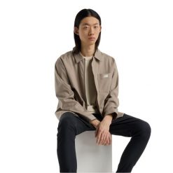 Kurtka letnia męska New Balance Squad Mag. Brązowe kurtki New Balance, na lato, m, bez wzorów, z materiału, bez kaptura. Za 900.99 zł.