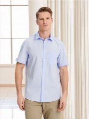 Koszula regular fit - błękitny. Niebieskie koszule Sinsay, l, bez wzorów, bez kołnierzyka, bez ramiączek. Za 29.99 zł.