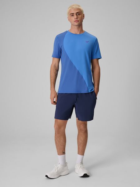 4F Spodenki tenisowe szybkoschnące męskie - granatowe L. Niebieskie krótkie spodenki sportowe 4F, l, bez wzorów, z materiału. Za 149.99 zł.
