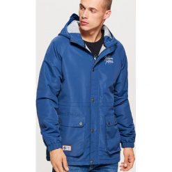 Casualowa kurtka z kapturem - Niebieski. Kurtki marki Under Armour. W wyprzedaży za 149.99 zł.