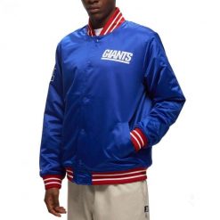 Kurtka męska do futbolu amerykańskiego Mitchell & Ness NFL New York Giants. Niebieskie kurtki Mitchell & Ness, m, bez wzorów, bez kaptura. Za 559.00 zł.