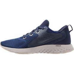 Nike Performance LEGEND REACT Obuwie do biegania treningowe blue void/thunder blue/obsidian/diffused taupe/moon particle. Buty do biegania marki Nike Performance. Za 419.00 zł.