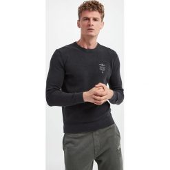 Sweter męski AERONAUTICA MILITARE. Szare swetry nierozpinane Aeronautica Militare, m, bez wzorów, z bawełny, bez kołnierzyka, bez ramiączek. W wyprzedaży za 421.43 zł.