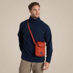 Torba na ramię Craghoppers Kiwi II. Czerwone torby na ramię Craghoppers, bez wzorów, z poliesteru, na ramię, bez dodatków. Za 131.75 zł.