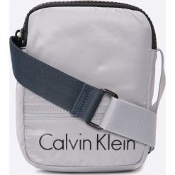 Calvin Klein Jeans - Saszetka Matthew. Saszetki i nerki marki Calvin Klein Jeans. W wyprzedaży za 219.90 zł.