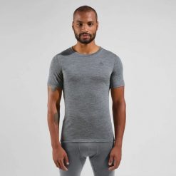 Koszulka termoaktywna z krótkim rękawem męska Odlo MERINO 200. Szare bielizna termoaktywna ODLO, l, bez wzorów, z materiału, bez ramiączek, narciarskie. Za 393.30 zł.