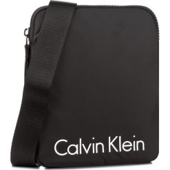Saszetka CALVIN KLEIN - Blithe Flat Crossover K50K503447 001. Saszetki i nerki marki CALVIN KLEIN. W wyprzedaży za 239.00 zł.