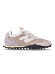 New Balance Skórzane sneakersy "RC30" w kolorze beżowo-jasnoróżowym rozmiar: 44,5. Brązowe buty sportowe casual New Balance, bez wzorów, z materiału, bez zapięcia. Za 360.17 zł.