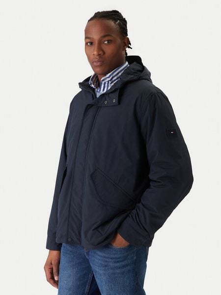 Tommy Hilfiger Kurtka przejściowa MW0MW42563 Granatowy Regular Fit. Niebieskie kurtki Tommy Hilfiger, l, bez wzorów, z syntetyku, bez kaptura. Za 1,199.00 zł.