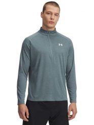 Under Armour Koszulka funkcyjna w kolorze błękitnym rozmiar: XL. Niebieskie t-shirty sportowe Under Armour, bez wzorów, z materiału, bez ramiączek, outdoorowe. Za 109.26 zł.