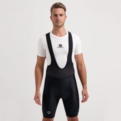 Spodenki rowerowe męskie Rogelli BASIC DE LUXE na szelkach. Czarne spodenki rowerowe Rogelli, m, bez wzorów, z materiału, rowerowe. Za 210.00 zł.