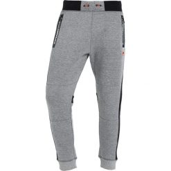 Superdry GYM TECH STRIPE JOGGER Spodnie treningowe grey grit/black. Joggery i bojówki marki Superdry. Za 339.00 zł.