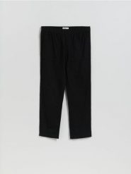 Bawełniane spodnie jogger - czarny. Czarne joggery i bojówki Reserved, l, bez wzorów, z bawełny. Za 119.99 zł.