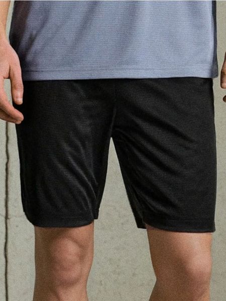 Szorty sportowe SNSY PERFORMANCE - czarny. Czarne krótkie spodenki sportowe Sinsay, l, bez wzorów, z materiału. Za 19.99 zł.