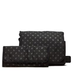 Saszetka Calvin Klein Jeans. Czarne torby na ramię Calvin Klein Jeans, bez wzorów, z jeansu, bez dodatków. Za 219.99 zł.
