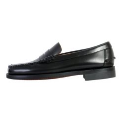 Klasyczne męskie buty żeglarskie Dan, czarne. Czarne sztyblety Sebago, bez wzorów, z gumy, bez obcasa, bez zapięcia. Za 813.85 zł.
