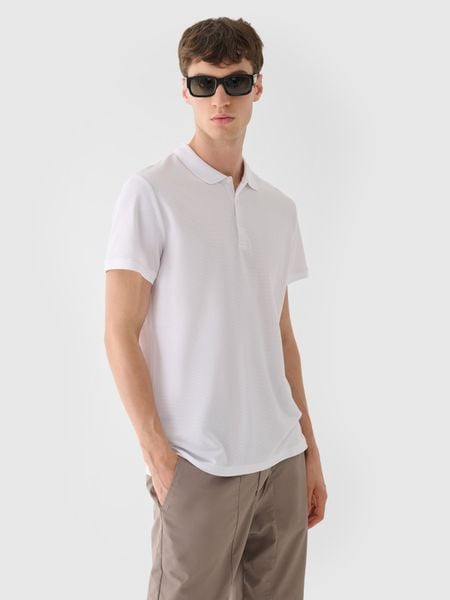 4F Koszulka polo męska - biała XL. Białe koszulki polo 4F, m, bez wzorów, z bawełny, bez kołnierzyka, bez ramiączek. W wyprzedaży za 59.99 zł.