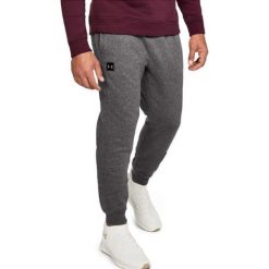Under Armour Spodnie męskie Rival Fleece Jogger grafitowe r. S (1320740-020). Joggery i bojówki marki Under Armour. Za 126.00 zł.