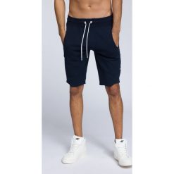 Spodenki dresowe męskie SKMD255 - ciemny granat. Krótkie spodenki sportowe marki 4F. Za 99.99 zł.