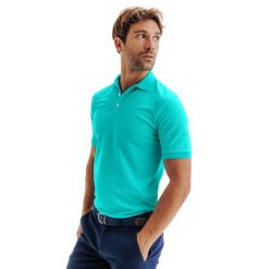 Koszulka polo do golfa z krótkim rękawem męska Inesis WW500. Niebieskie koszulki polo INESIS, l, bez wzorów, z materiału, bez kołnierzyka, bez ramiączek. Za 99.99 zł.