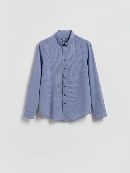 Koszula slim fit - granatowy. Niebieskie koszule Reserved, l, bez wzorów, z tkaniny, bez kołnierzyka, bez ramiączek. Za 129.99 zł.