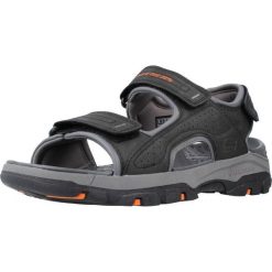 Sandały SKECHERS TRESMEN - GARO Czarny. Czarne sandały Skechers, z materiału, bez zapięcia. Za 223.99 zł.