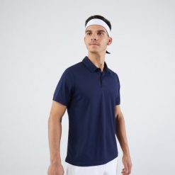 Koszulka polo do tenisa męska Artengo Essential. Niebieskie koszulki polo ARTENGO, m, bez wzorów, z materiału, bez kołnierzyka, bez ramiączek. Za 34.99 zł.