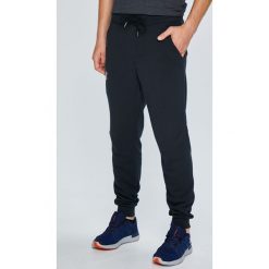 Under Armour - Spodnie Rival Cotton Jogger. Szare joggery i bojówki marki Under Armour, z bawełny. W wyprzedaży za 219.90 zł.