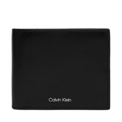 Portfel Calvin Klein. Czarne portfele CALVIN KLEIN, bez wzorów. Za 329.99 zł.