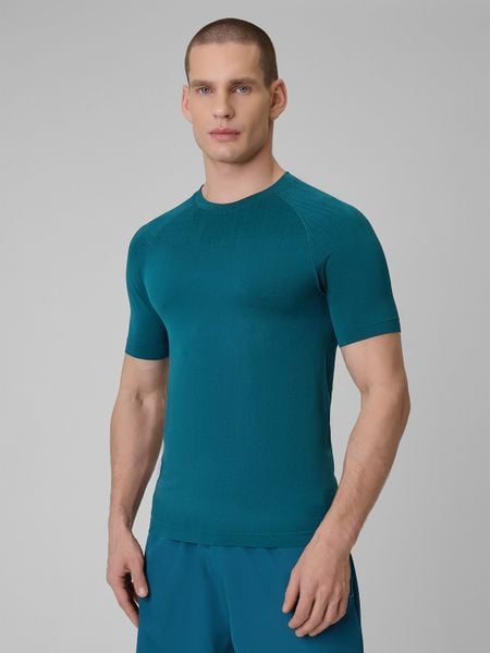 4F Koszulka treningowa slim bezszwowa męska - granatowa S/M. Niebieskie t-shirty 4F, bez wzorów, ze skóry, bez ramiączek, na fitness i siłownię. Za 99.99 zł.