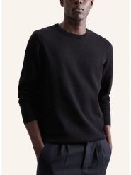 Seidensticker Sweter w kolorze czarnym rozmiar: L. Czarne swetry nierozpinane Seidensticker, l, bez wzorów, z bawełny, bez kołnierzyka, bez ramiączek. Za 168.46 zł.