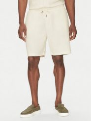 Guess Szorty sportowe M5GD41 KCRY0 Écru Regular Fit. Krótkie spodenki sportowe Guess, m, z aplikacjami, z syntetyku. Za 369.99 zł.