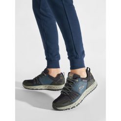 Trekkingi Skechers. Niebieskie buty trekkingowe Skechers, bez wzorów, bez zapięcia. Za 329.99 zł.