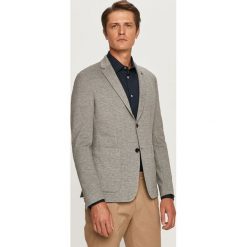 Calvin Klein - Marynarka. Szare garnitury CALVIN KLEIN, bez wzorów, z dzianiny, klasyczne. W wyprzedaży za 579.90 zł.