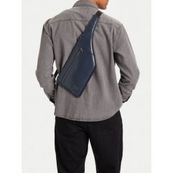 Saszetka G-Star Raw. Niebieskie saszetki i nerki G-Star Raw, bez wzorów, małe, bez dodatków. Za 149.99 zł.