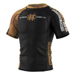 Koszulka Męska na siłownię rashguard MMA EXTREME HOBBY GOLDEN WARRIOR. Czarne bielizna termoaktywna EXTREME HOBBY, l, bez wzorów, z bawełny, bez ramiączek, na fitness i siłownię. Za 199.00 zł.