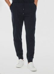 Dzianinowe spodnie dresowe w granatowym kolorze. Spodnie materiałowe Pako Lorente, na co dzień, l, bez wzorów, z bawełny. Za 99.99 zł.