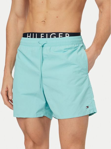 Tommy Hilfiger Szorty kąpielowe UM0UM03749 Turkusowy Regular Fit. Niebieskie kąpielówki Tommy Hilfiger, l, bez wzorów, z syntetyku. Za 260.99 zł.