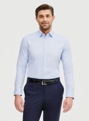 PAKO LORENTE – Gładka koszula męska w kolorze niebieskim. Niebieskie koszule Pako Lorente, m, bez wzorów, z bawełny, bez kołnierzyka, bez ramiączek. Za 299.99 zł.