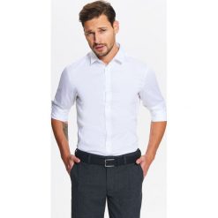 KOSZULA MĘSKA ELEGANCKA Z JEDWABISTYM WYKOŃCZENIEM TKANINY O DOPASOWANYM KROJU. Koszule marki TOP SECRET. W wyprzedaży za 39.99 zł.
