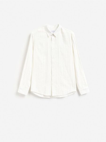 Koszula slim fit z bawełną - złamana biel. Koszule Reserved, l, bez wzorów, z bawełny, bez kołnierzyka, bez ramiączek. Za 119.99 zł.