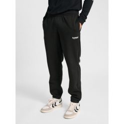 Spodnie do biegania Hummel Legacy 2.0. Czarne spodnie materiałowe Hummel, na co dzień, na lato, bez wzorów, z dresówki, sportowe. Za 269.50 zł.