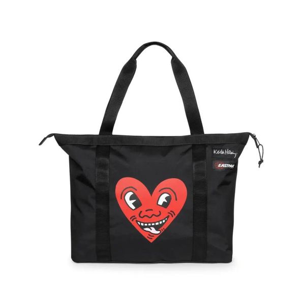 Torba podróżna Eastpak x Keith Haring Travel. Czarne torby na ramię Eastpak, bez wzorów, z materiału, na ramię, bez dodatków. Za 342.50 zł.