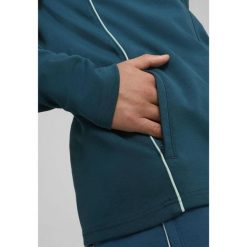 Kurtka z dresu OM 2024/25. Niebieskie kurtki Puma, bez wzorów, z dresówki, bez kaptura. W wyprzedaży za 278.30 zł.