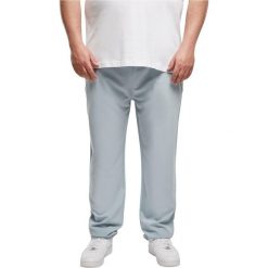 Spodnie dresowe Urban Classics Tapered. Niebieskie spodnie materiałowe Urban Classics, na co dzień, m, bez wzorów, z dresówki, casualowe. Za 244.50 zł.