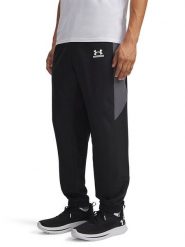 Under Armour Spodnie dresowe w kolorze czarnym rozmiar: XL. Czarne spodnie treningowe długie Under Armour, xl, bez wzorów, z dresówki. Za 159.95 zł.