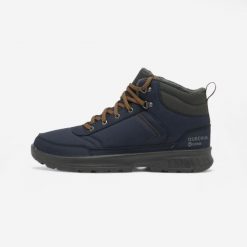 Buty turystyczne męskie Quechua NH100 Mid wodoodporne. Niebieskie buty trekkingowe QUECHUA, na zimę, bez wzorów, przed kolano, bez zapięcia, trekkingowe. Za 159.99 zł.