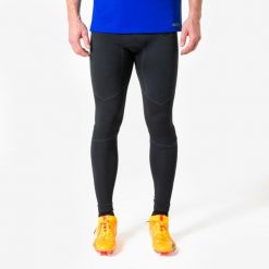 Legginsy piłkarskie Kipsta Keepdry Warm. Czarne legginsy długie sportowe KIPSTA, xl, bez wzorów, z dzianiny, do piłki nożnej. Za 119.99 zł.