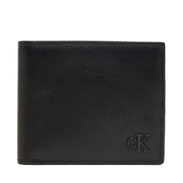 Portfel Calvin Klein. Czarne portfele CALVIN KLEIN, bez wzorów. Za 329.99 zł.