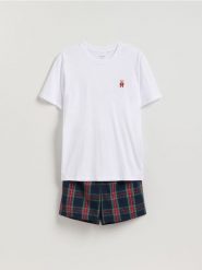 Dwuczęściowa piżama ze świątecznym motywem - biały. Białe piżamy Reserved, l, bez wzorów, z bawełny, bez ramiączek. Za 99.99 zł.